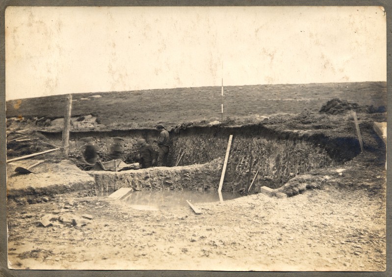 Digging a hole. Somebody kept very still